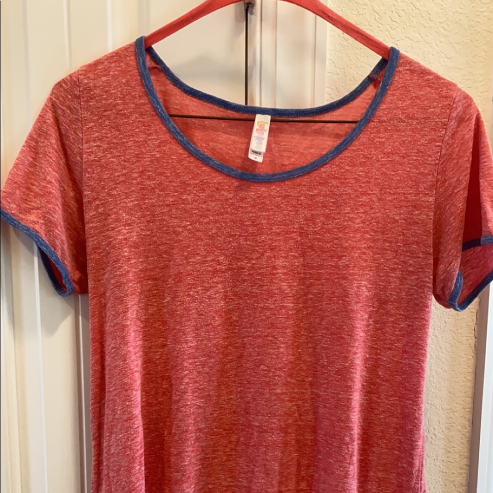 Lularoe classic tee size medium. Pink with blue rings around sleeves and neck.